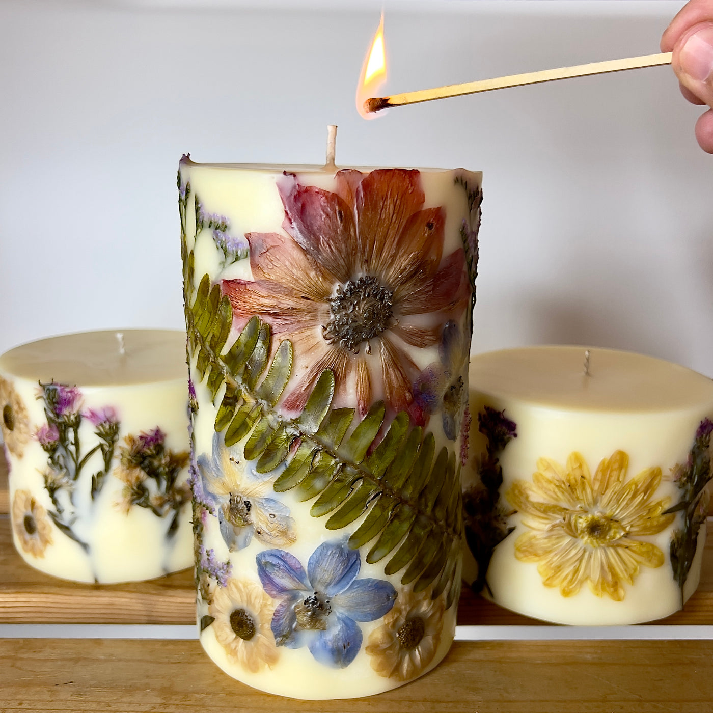 נר פרחי חורף יצוק